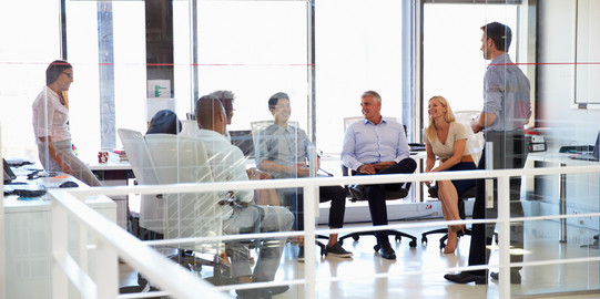 meeting situation 02 six people sitting together in a bright room are facing each other
