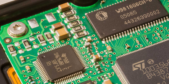 Close-up of computer board A close-up of a computer board in green.